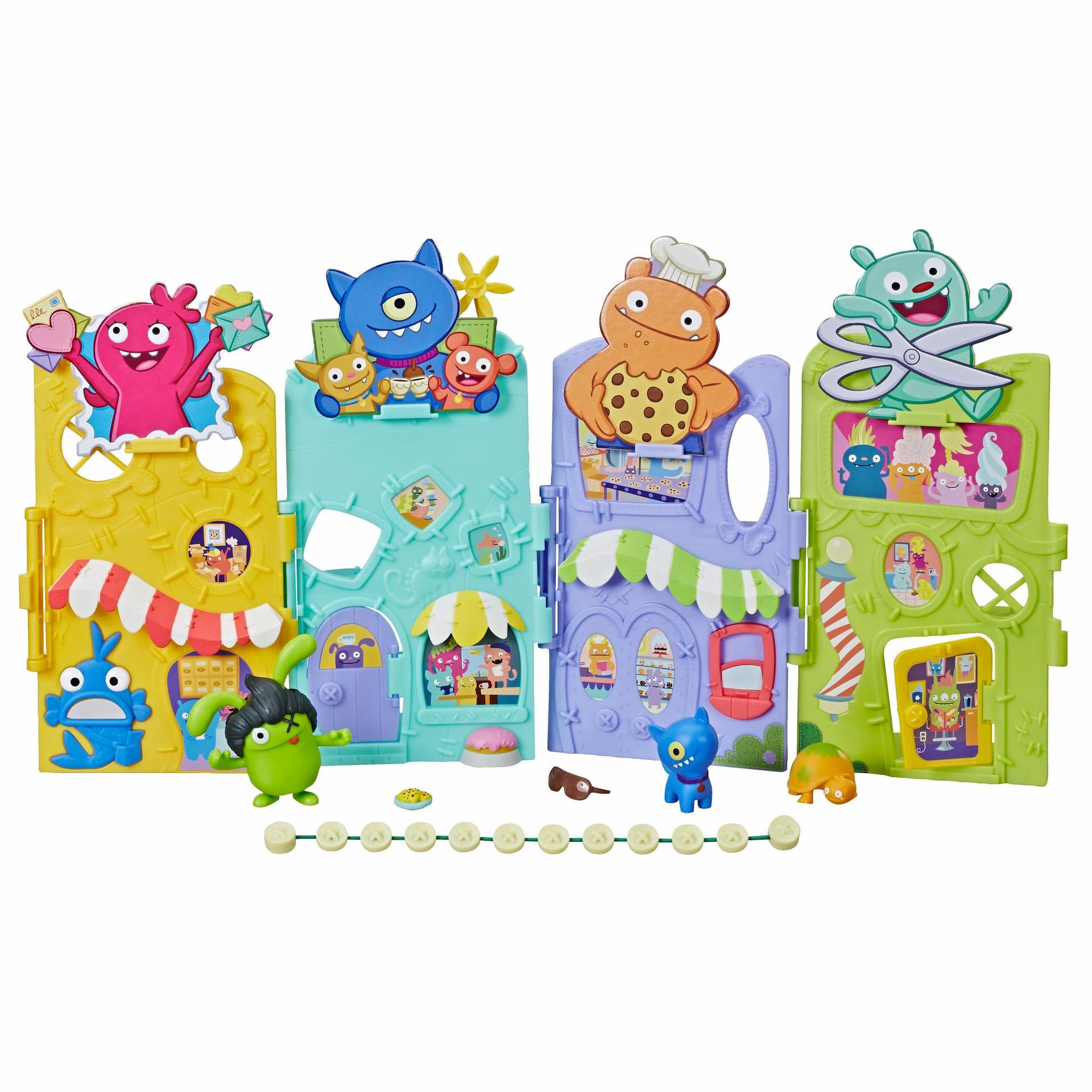 UglyDolls - Ensemble déployable de la rue principale d'Uglyville avec fourre-tout, 3 figurines et accessoires